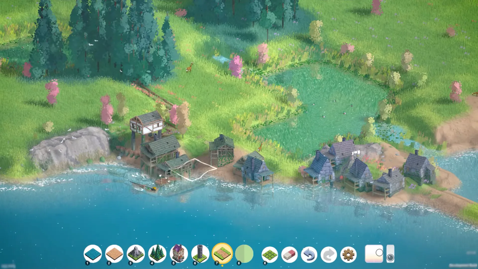 Lakeside half-timbered houses with a white rectangular selection box on one building and the Brushland build toolbar visible.